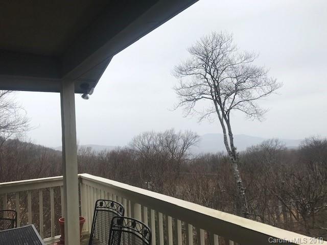 212 Pine Ridge Road Beech Mountain, NC 28604 - Photo 16 of 27 a view of a balcony with mountain view