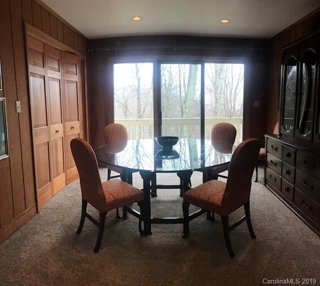 212 Pine Ridge Road Beech Mountain, NC 28604 - Photo 26 of 27 a dining room with furniture and windows