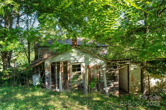 a view of a bird house next to road