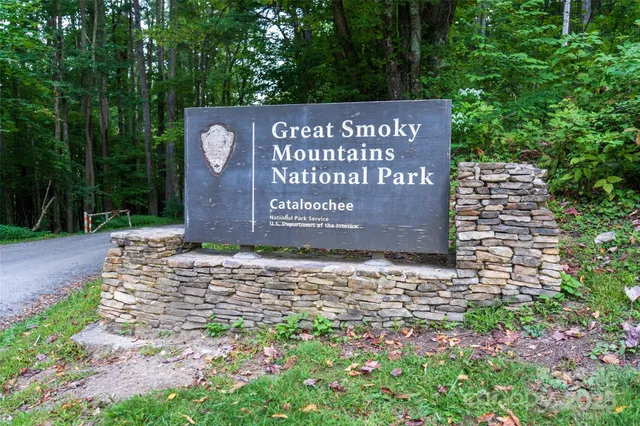 a view of lake with mountain in the background