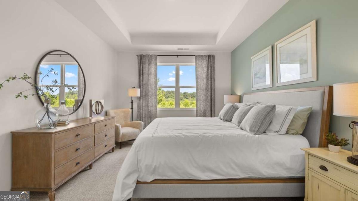 111 Cattle Drive Perry, GA 31069 - Photo 12 of 47 a bedroom with a bed and a window