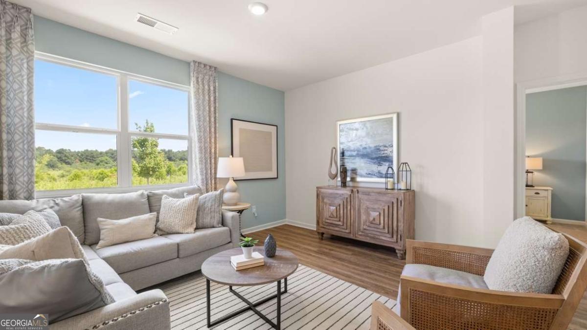 111 Cattle Drive Perry, GA 31069 - Photo 24 of 47 a living room with furniture and a window