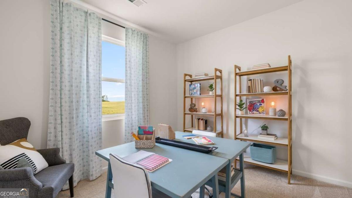 111 Cattle Drive Perry, GA 31069 - Photo 38 of 47 a view of a workspace with furniture and a couch