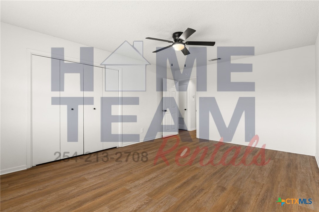 1005 Eastside Drive, Unit B Killeen, TX 76543 - Photo 8 of 11 a view of a room with wooden floor