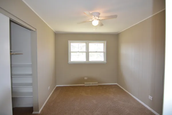 a view of a room that has a window in it