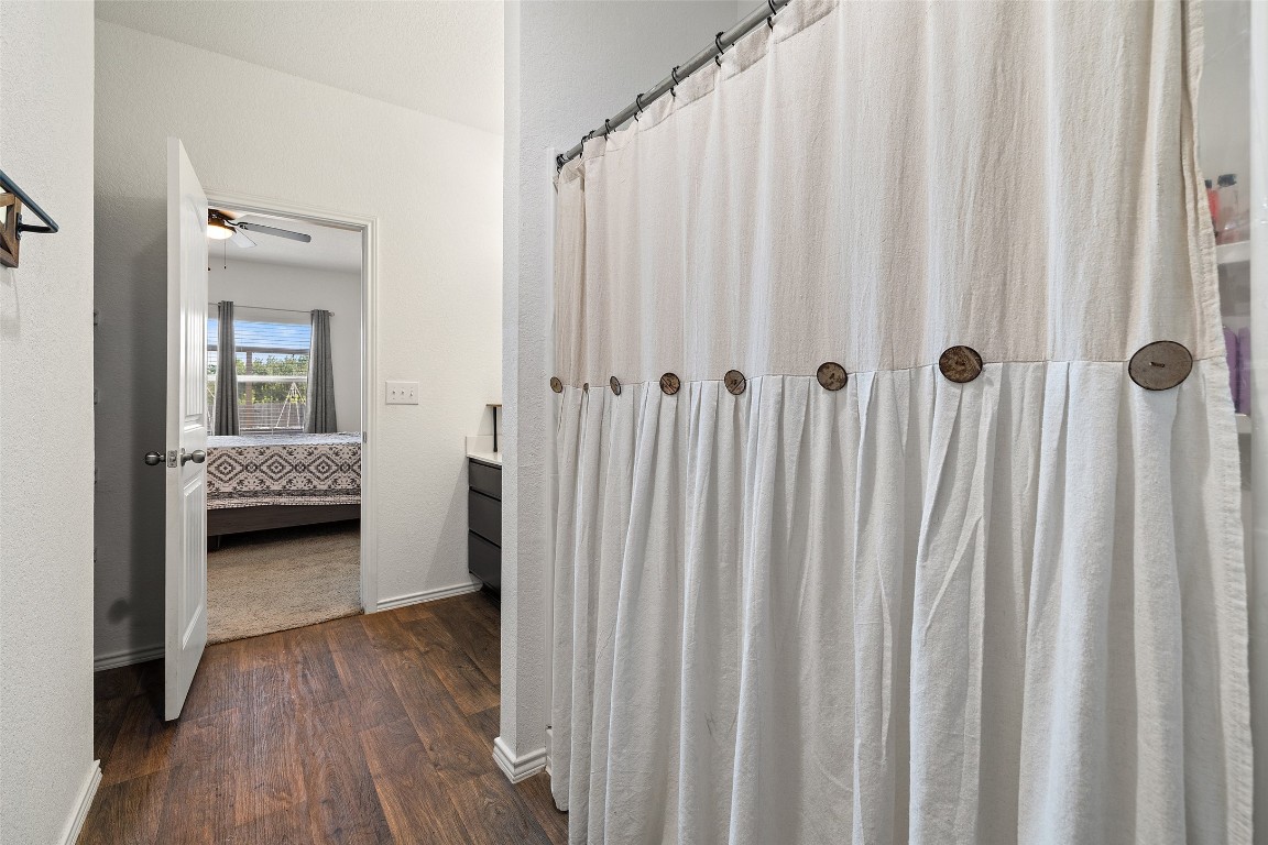 11801 Riprap Drive Manor, TX 78653 - Photo 25 of 40 a view of a bedroom from a hallway