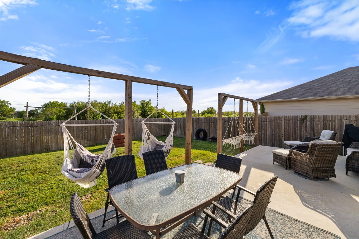 11801 Riprap Drive Manor, TX 78653 - Photo 34 of 40 a view of a patio with swimming pool