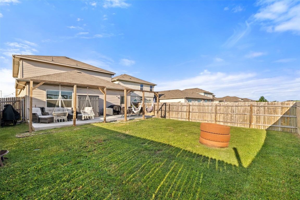 11801 Riprap Drive Manor, TX 78653 - Photo 38 of 40 a view of an house with backyard space and balcony