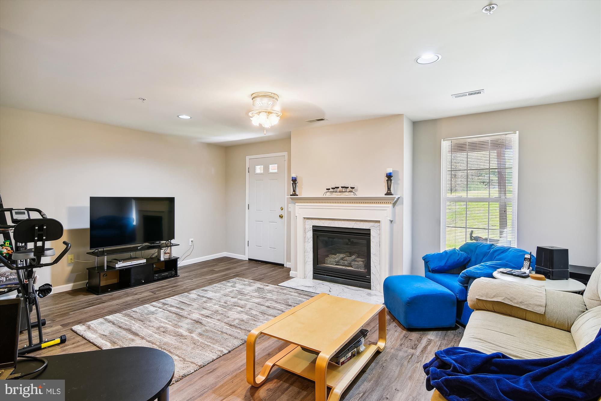4431 Kentford Road Owings Mills, MD 21117 - Photo 29 of 37 Finished walk-out basement and cozy gas fireplace
