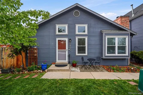 a house view with a garden space