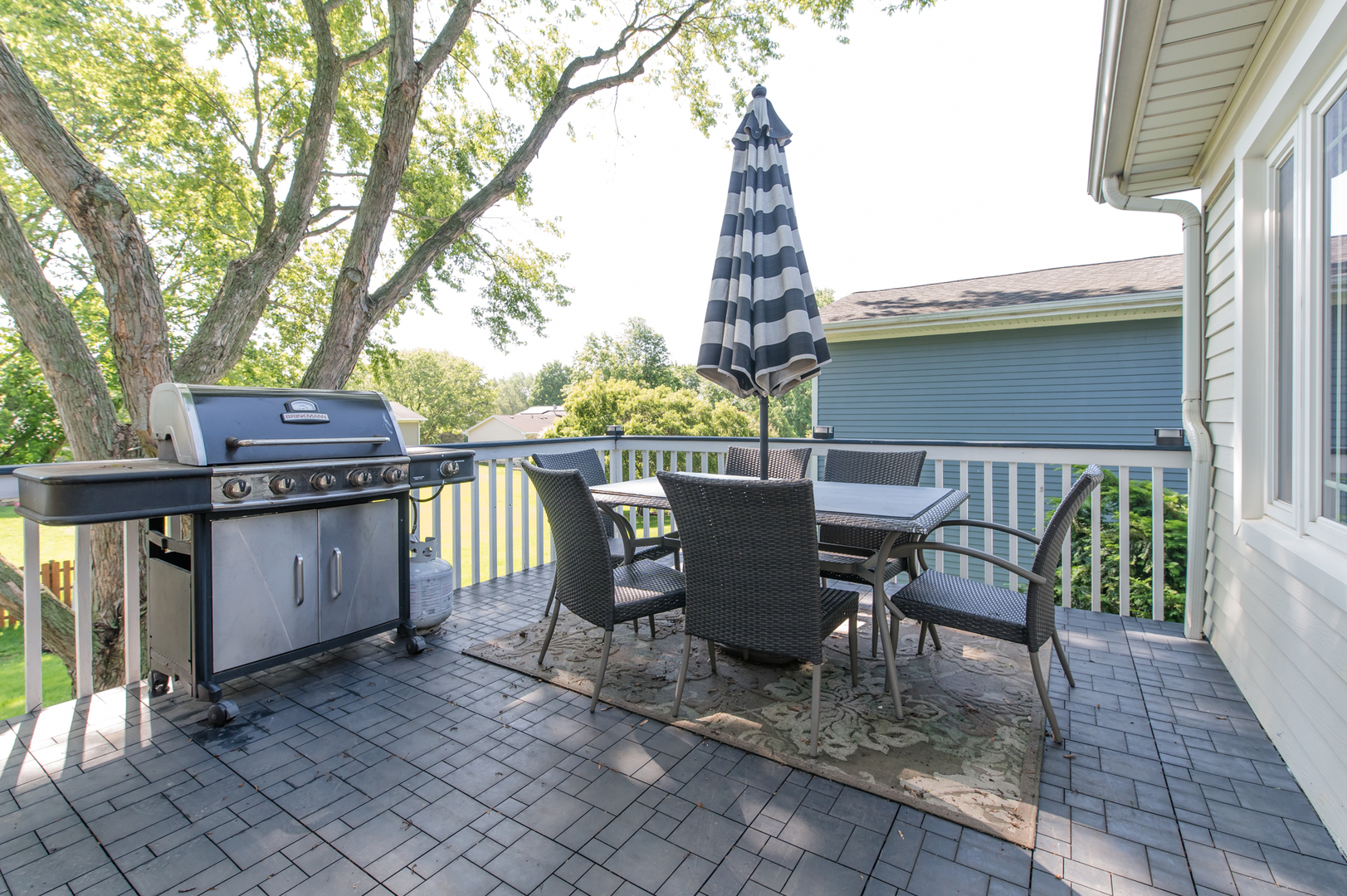 73 Fairfield Lane Cary, IL 60013 - Photo 18 of 33 a view of a patio with table and chairs