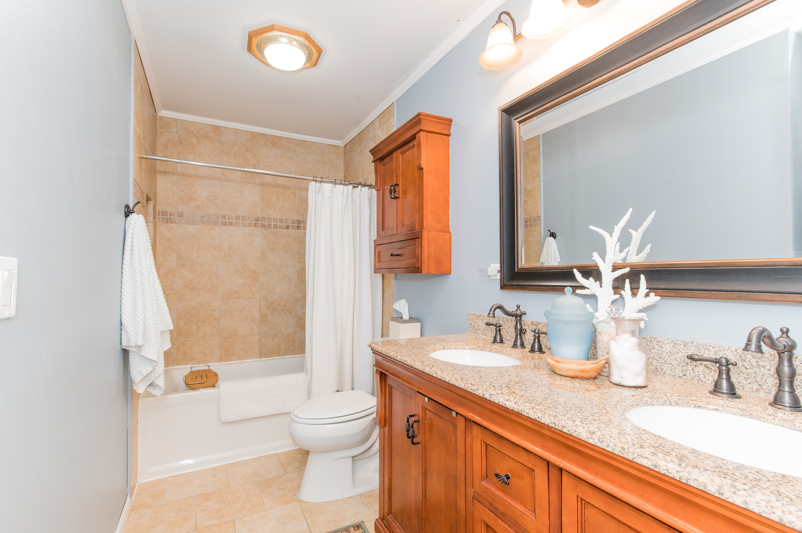 73 Fairfield Lane Cary, IL 60013 - Photo 28 of 33 a bathroom with a granite countertop sink mirror vanity and toilet