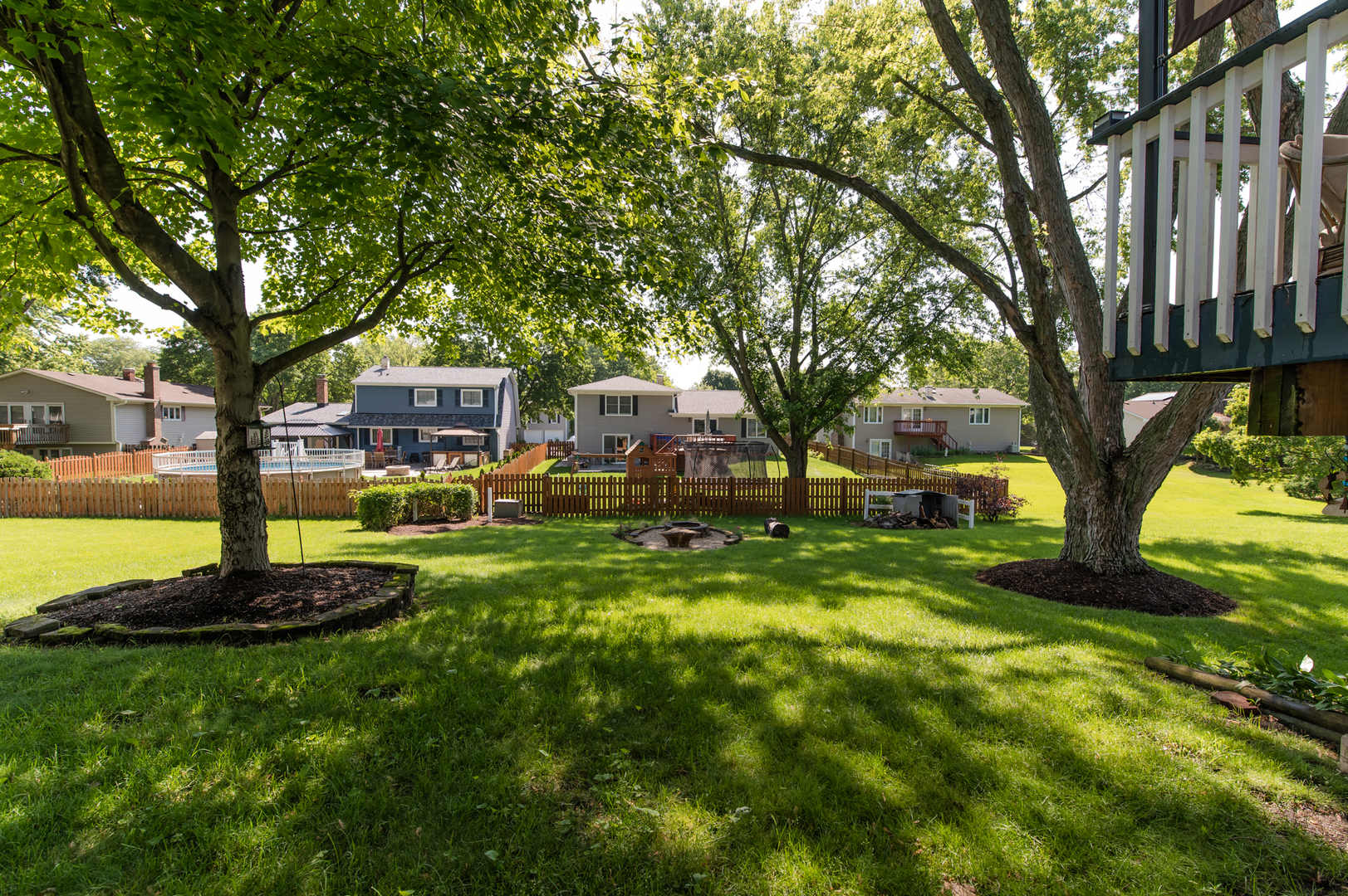 73 Fairfield Lane Cary, IL 60013 - Photo 6 of 33 a backyard of a house with lots of green space