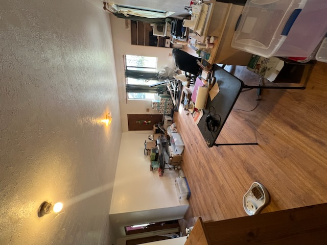 16-2071 Ao Rd Mountain View Pahoa, HI 96778 - Photo 6 of 13 a living room with furniture a flat screen tv and a table