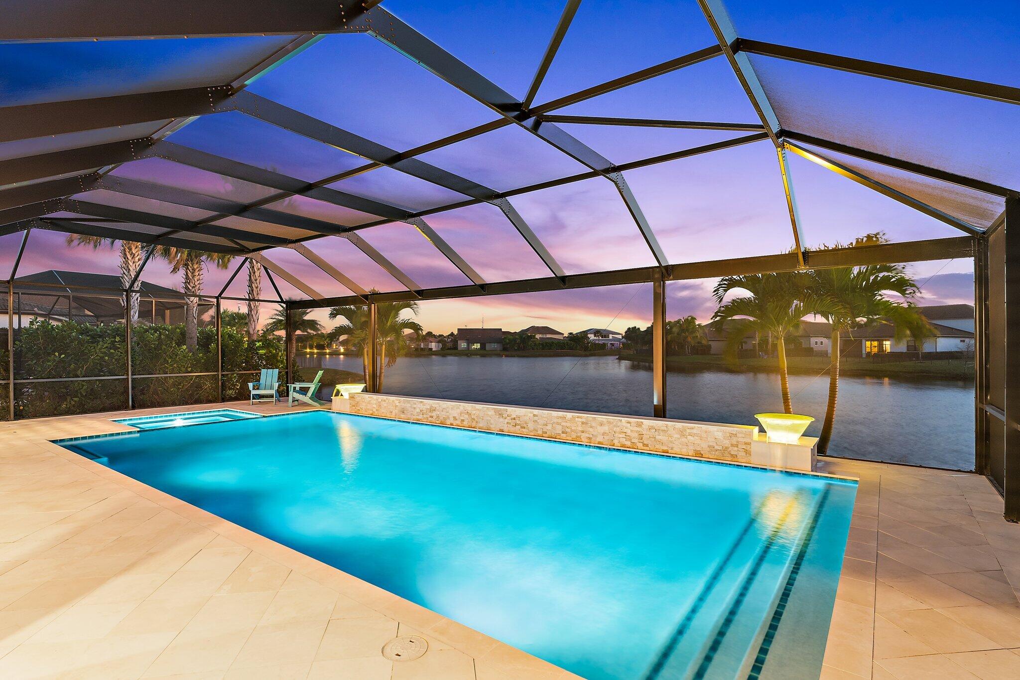 134 Indigo River Point Jupiter, FL 33478 - Photo 2 of 71 Pool and View to Lake