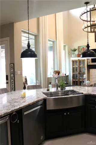 a kitchen with a sink and a window