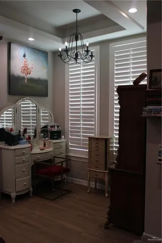 a kitchen with sink and cabinets