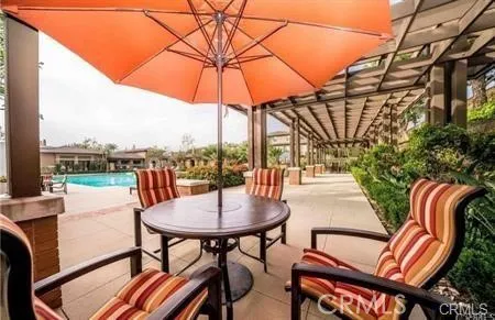 a view of yard with patio