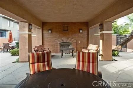 a living room with furniture oven and a fireplace