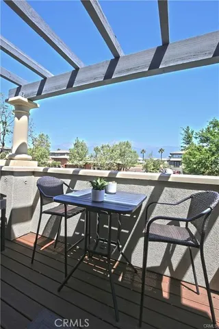 a view of a chairs and table on the terrace