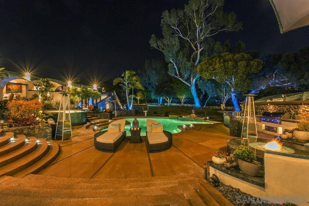 9805 Blackgold Road La Jolla, CA 92037 - Photo 31 of 32 a view of a swimming pool with a patio