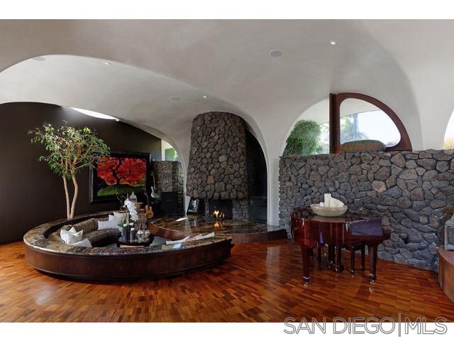9805 Blackgold Road La Jolla, CA 92037 - Photo 5 of 32 a view of a dining room with furniture and chandelier