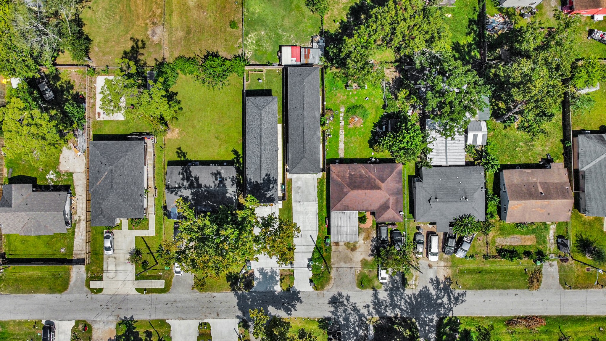 8125 Laura Koppe Road, Unit A Houston, TX 77028 - Photo 36 of 38 an aerial view of a house with a yard and large trees