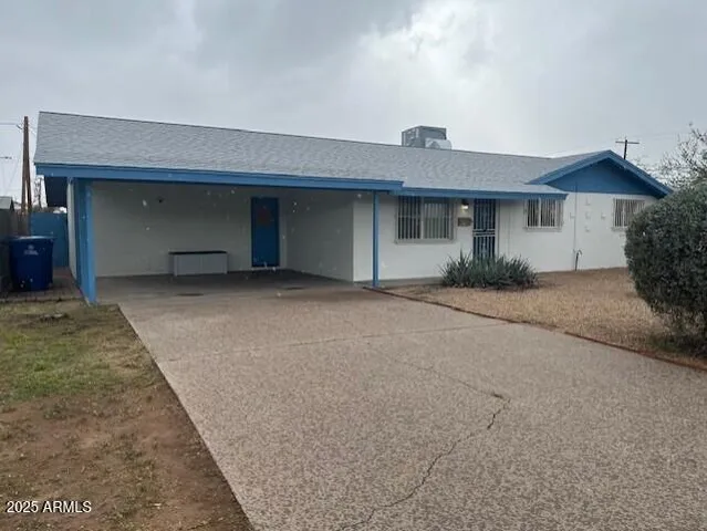a front view of a house with a garage