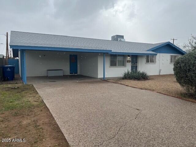 a front view of a house with a garage