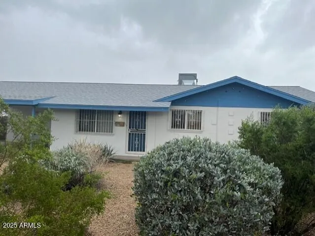 a house view with a outdoor space
