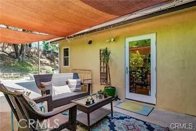 a building outdoor space with patio furniture