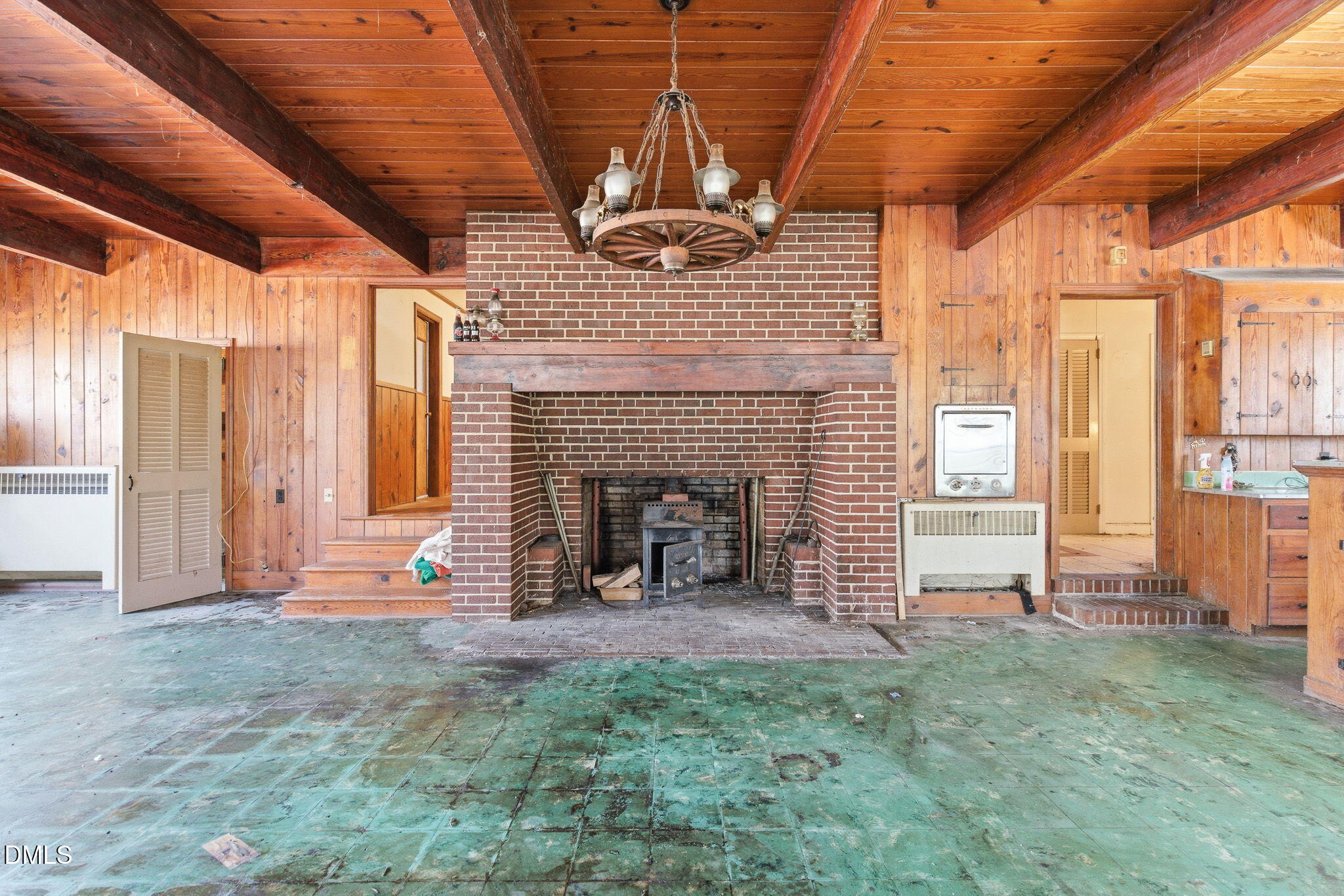 1603 Sykes Road Mebane, NC 27302 - Photo 7 of 45 a view of an empty room with a fireplace