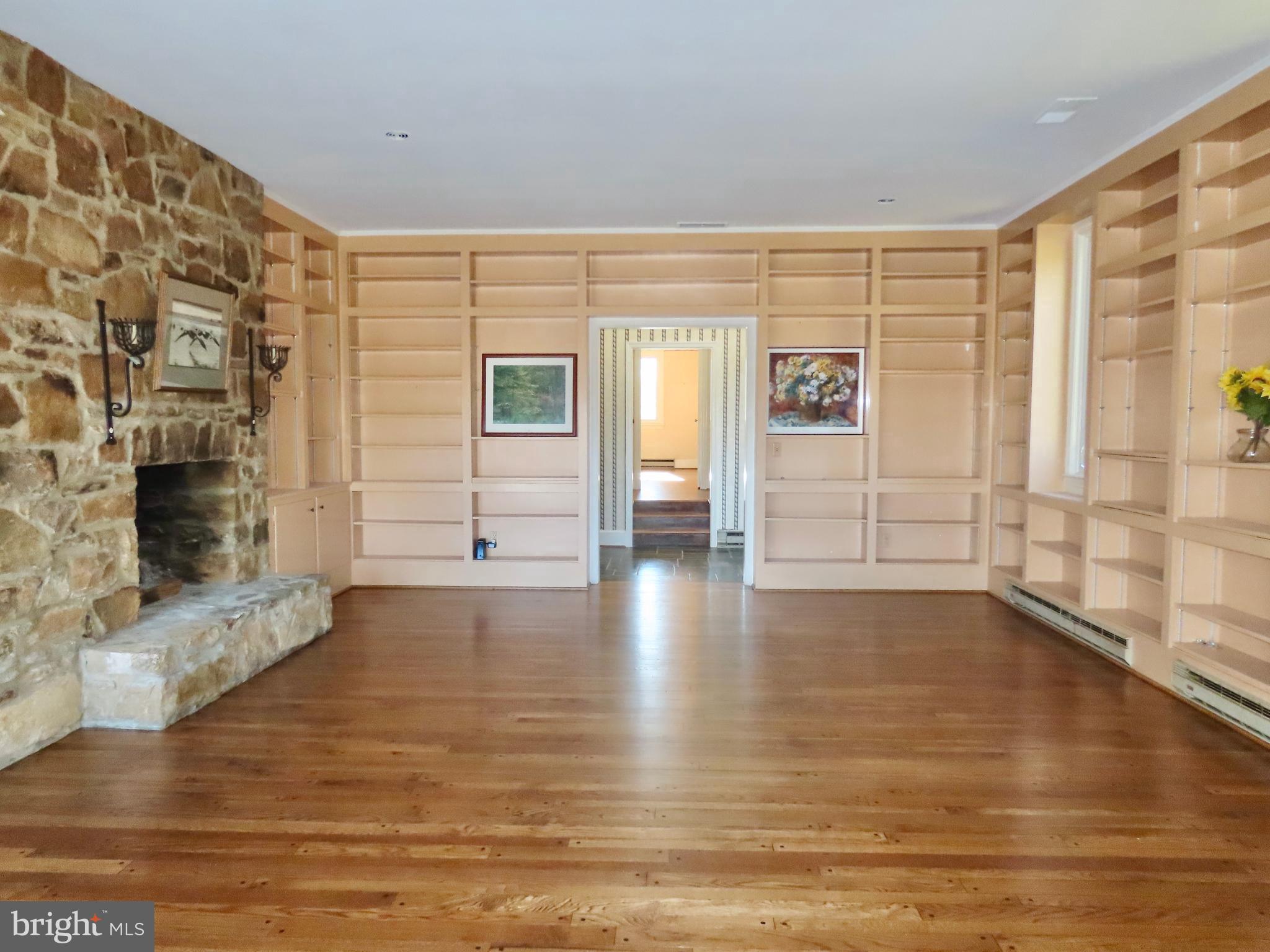 419 Rudasill Mill Road Woodville, VA 22749 - Photo 9 of 42 18 X 25 Living Room w/ fireplace & display shelves
