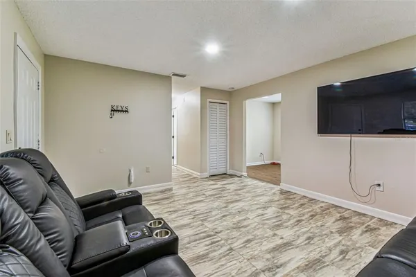 a kitchen that has a sink and a stove in it