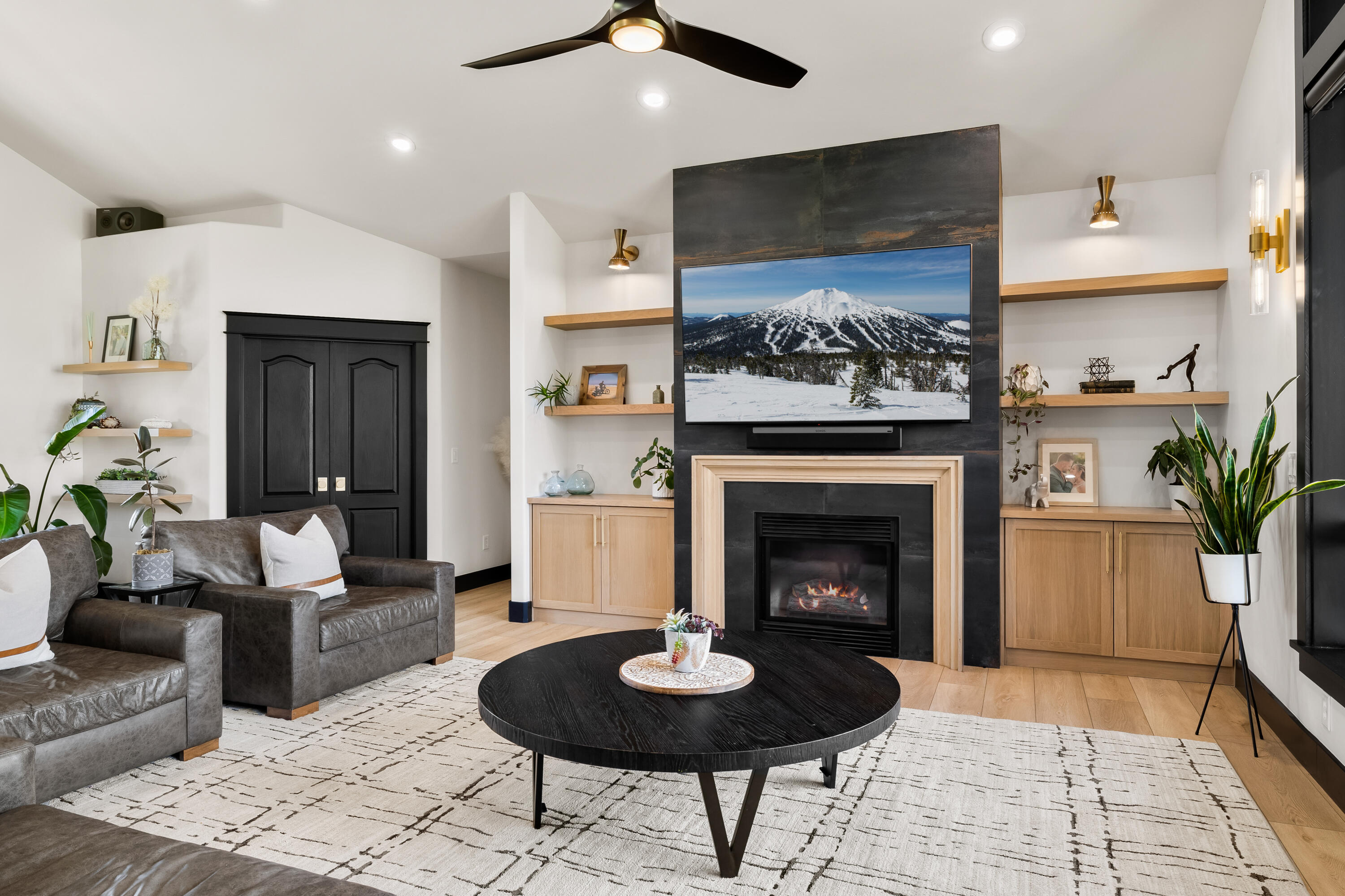 62705 Hamby Road Bend, OR 97701 - Photo 12 of 49 a living room with furniture and a fireplace