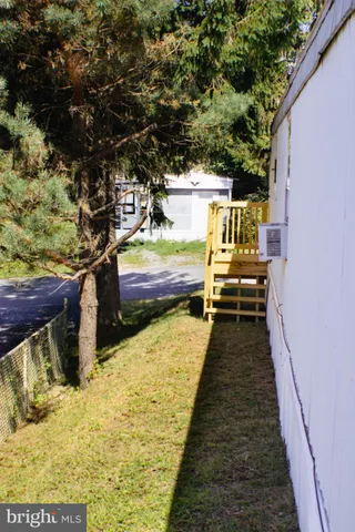 a view of a balcony with an outdoor space