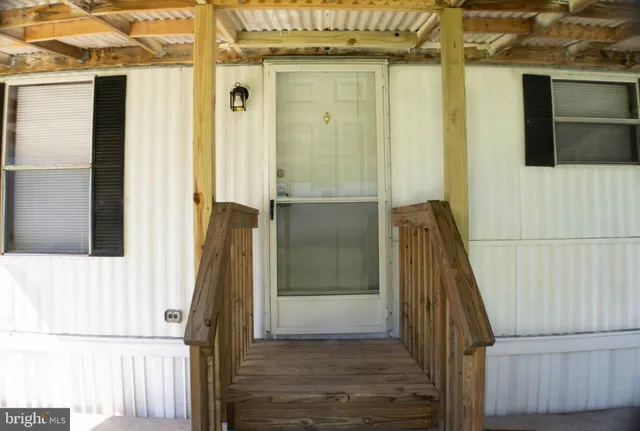 a view of a entryway door of the house
