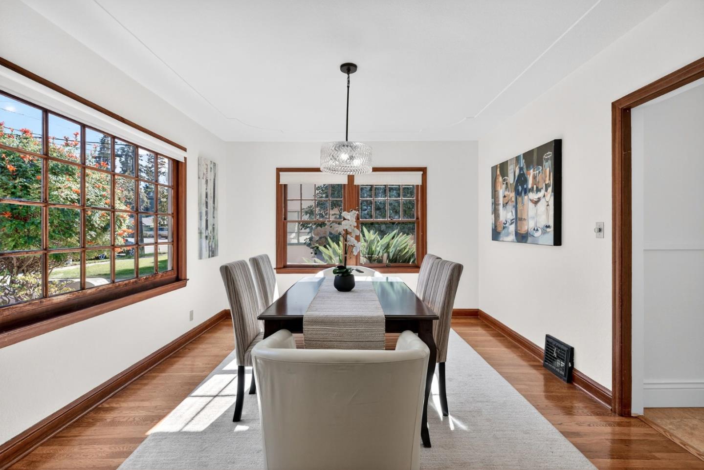1087 Merle Avenue San Jose, CA 95125 - Photo 11 of 49 a dining room with furniture window and wooden floor