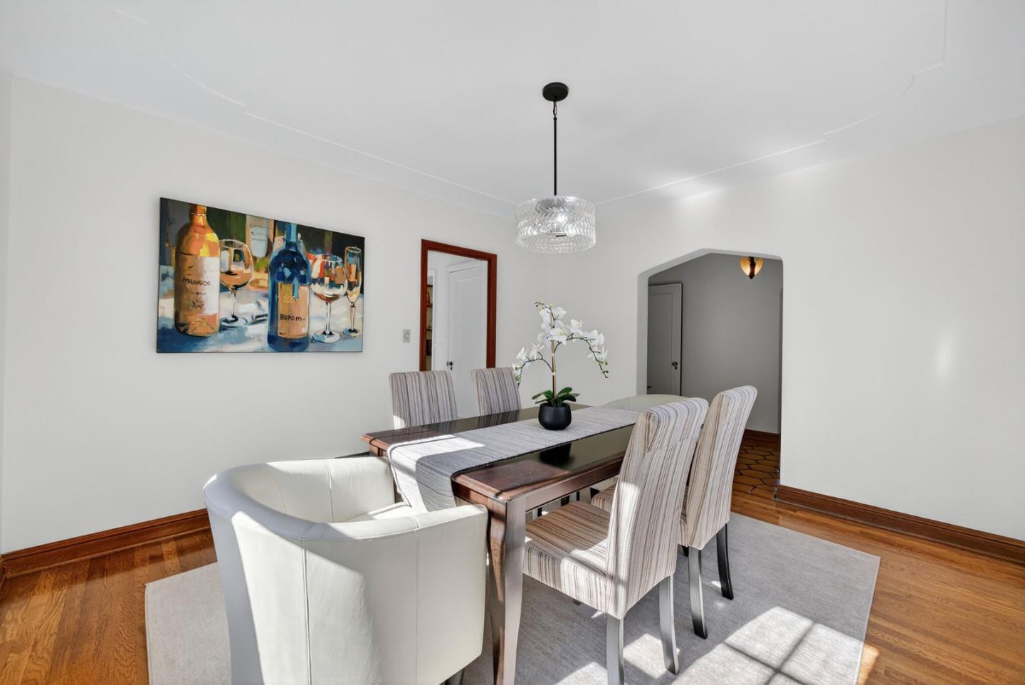 1087 Merle Avenue San Jose, CA 95125 - Photo 13 of 49 a view of a dining room with furniture and wooden floor