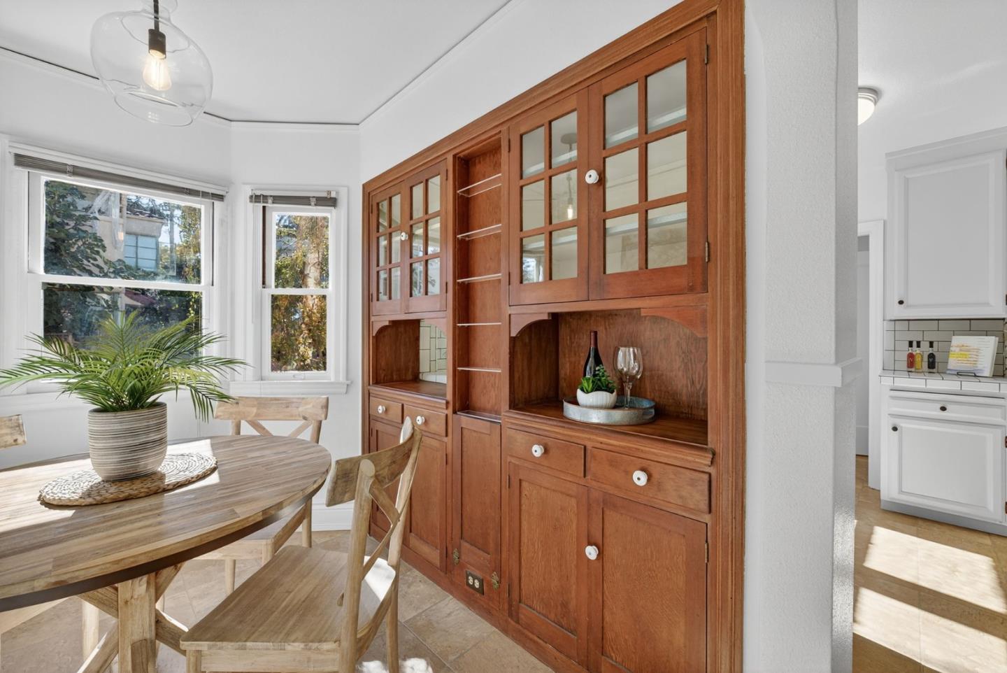 1087 Merle Avenue San Jose, CA 95125 - Photo 16 of 49 a view of a dining room with furniture window and wooden floor
