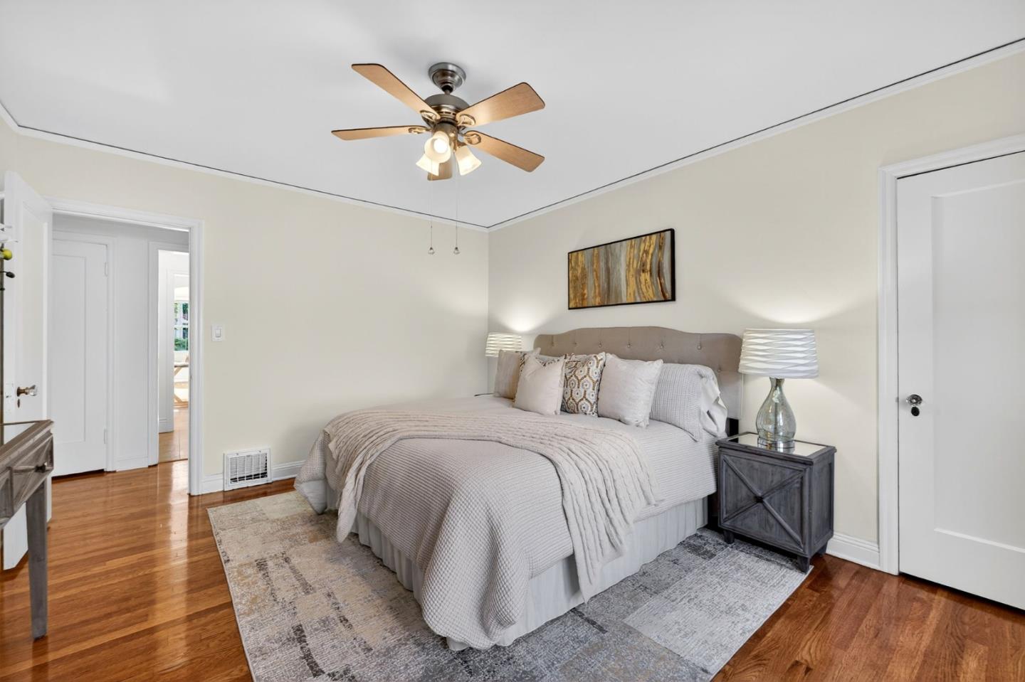 1087 Merle Avenue San Jose, CA 95125 - Photo 29 of 49 a spacious bedroom with a bed and wooden floor