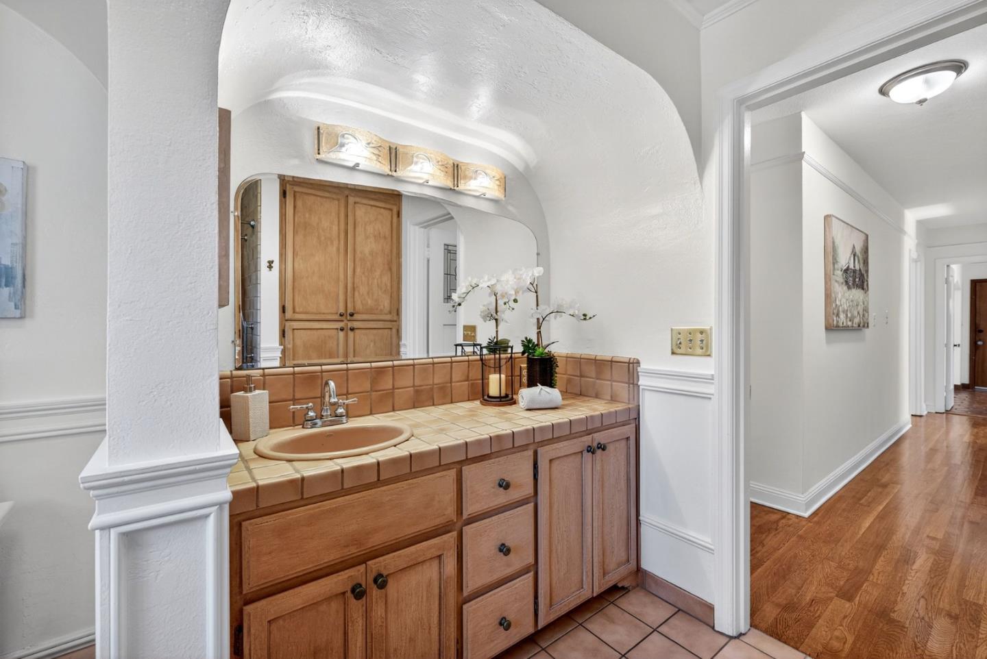 1087 Merle Avenue San Jose, CA 95125 - Photo 33 of 49 a bathroom with a sink and a mirror