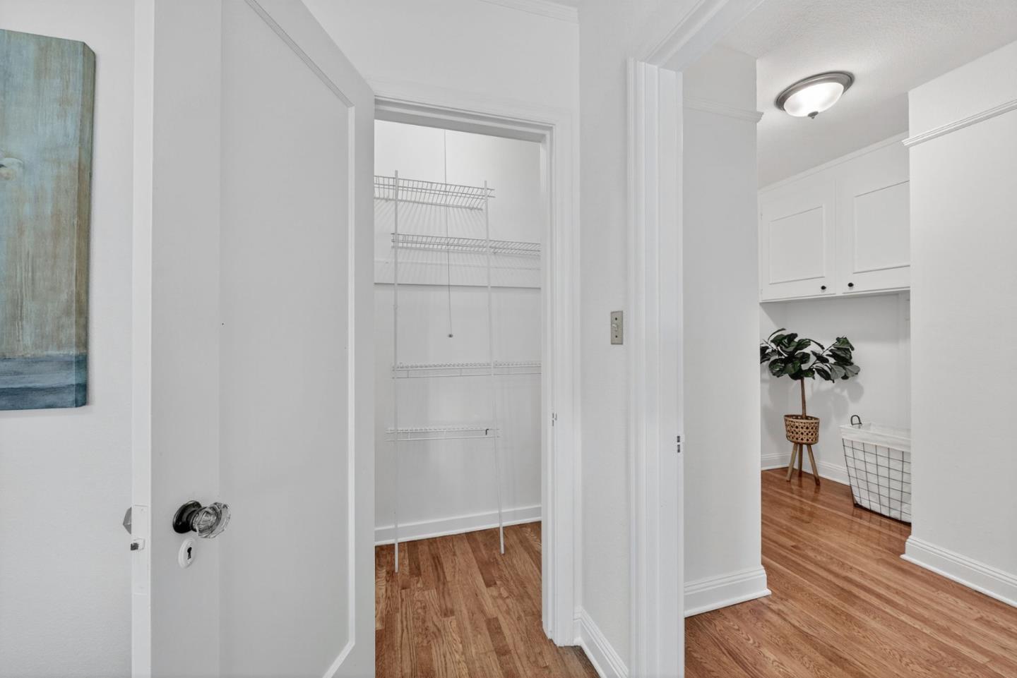 1087 Merle Avenue San Jose, CA 95125 - Photo 36 of 49 a view of a hallway with wooden floor and closet