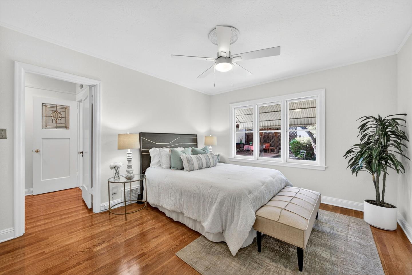 1087 Merle Avenue San Jose, CA 95125 - Photo 37 of 49 a bedroom with a large bed and a window