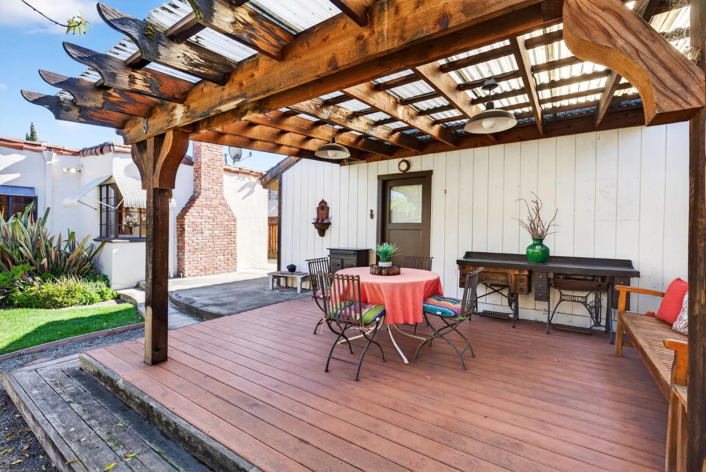 1087 Merle Avenue San Jose, CA 95125 - Photo 42 of 49 a patio with patio outdoor dining table and chairs with wooden floor