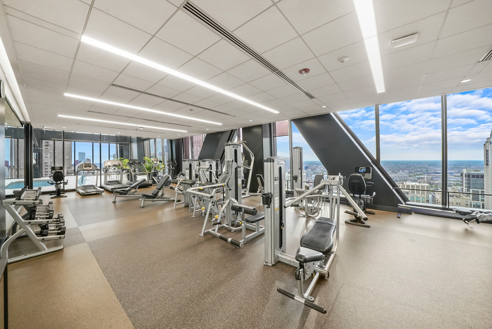 175 East Delaware Place, Unit 7107 Chicago, IL 60611 - Photo 28 of 42 a view of a room with gym equipment