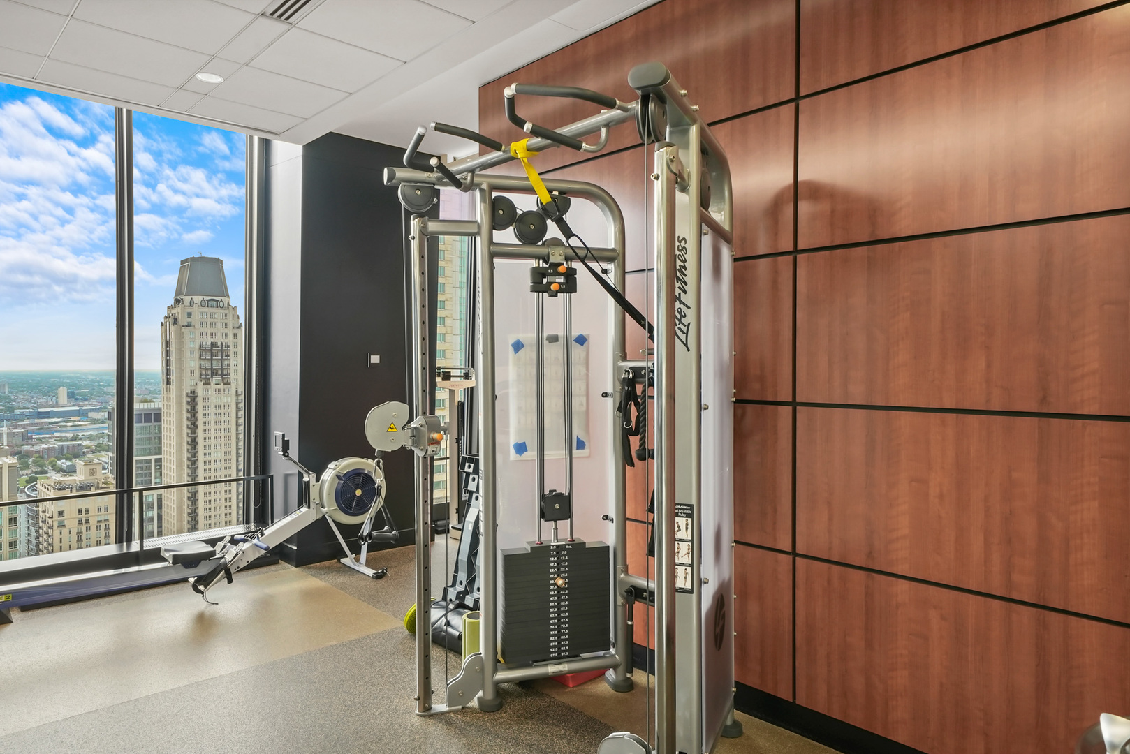175 East Delaware Place, Unit 7107 Chicago, IL 60611 - Photo 29 of 42 a view of a room with gym equipment