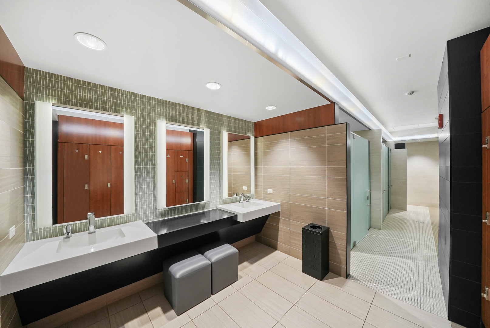 175 East Delaware Place, Unit 7107 Chicago, IL 60611 - Photo 32 of 42 a bathroom with double vanity and a mirror