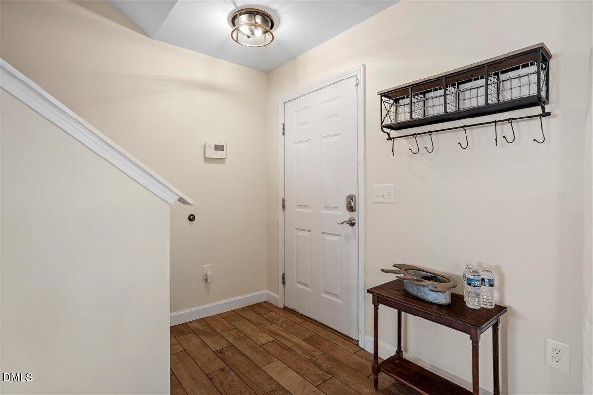 205 Battery Way Bunnlevel, NC 28323 - Photo 5 of 37 a view of an entryway with wooden floor