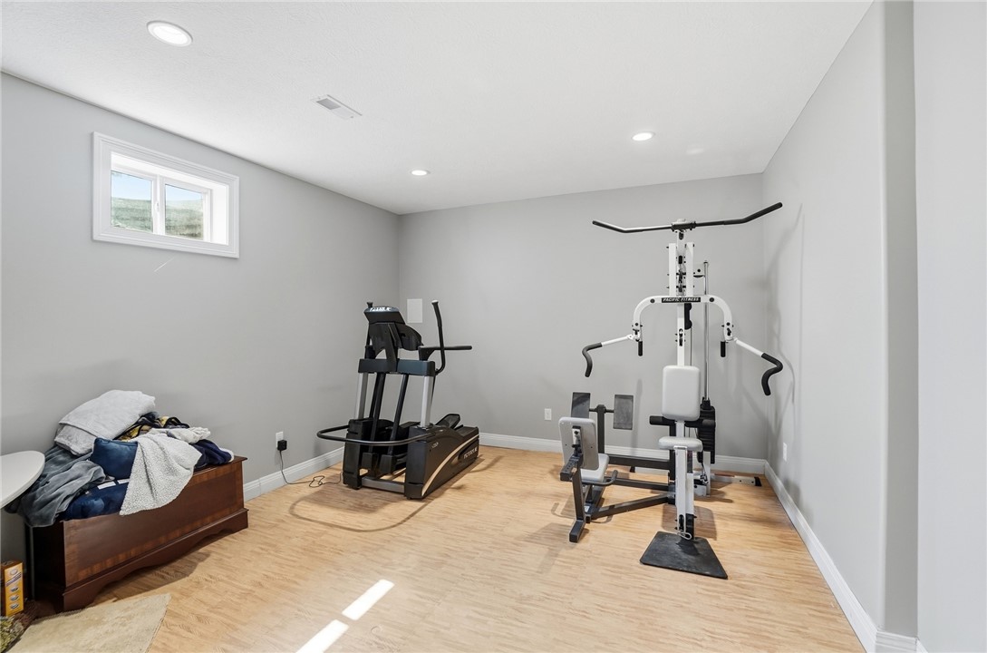 472 Timber Walk Court Springboro, OH 45066 - Photo 45 of 86 This spacious exercise room features bright lighting and durable flooring, ideal for a dedicated workout space.